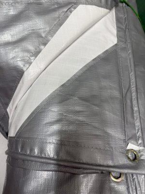 Tấm bạt nhựa PE may viền đóng khuy che tàu thuyền