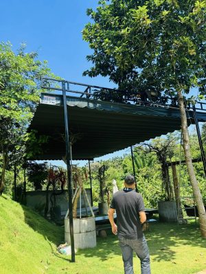 Bạt mái xếp lượn sóng che nắng sân vườn